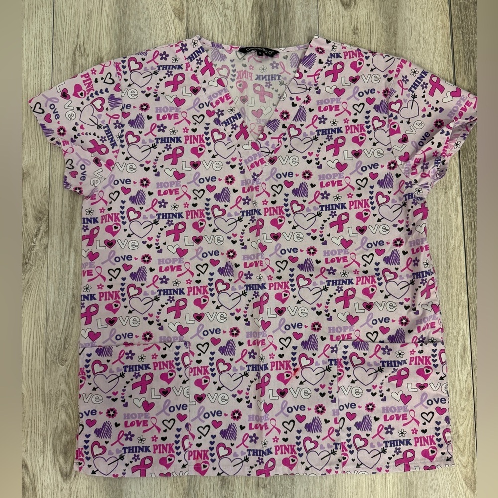 Cassandra O. women’s pink ribbon breast cancer awareness scrub top